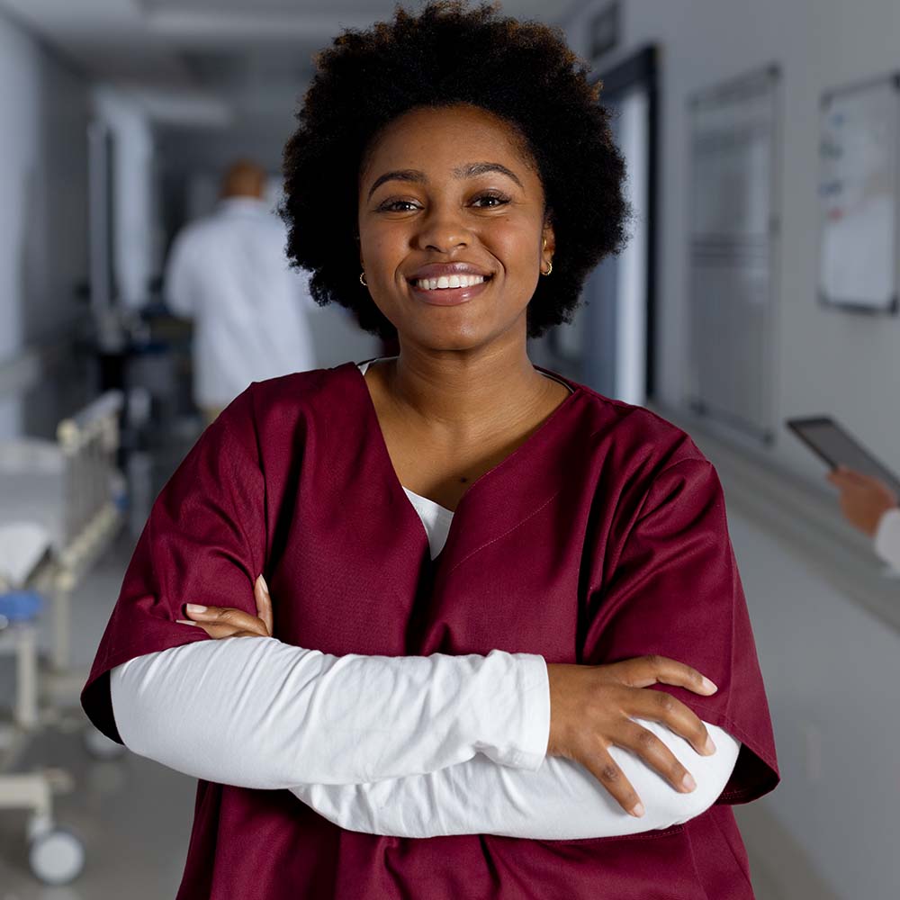 portrait of happy african american female doctor w FGZGK58